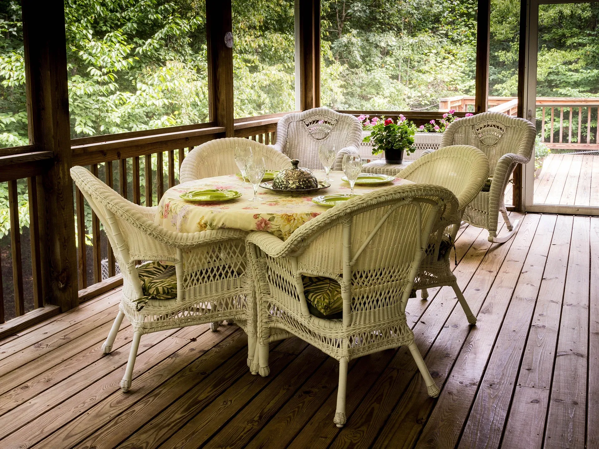 Custom Nashville porch with comfortable seating, greenery, and durable construction